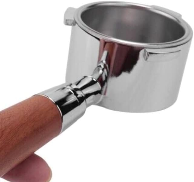 Close-up of stainless steel espresso portafilter with wooden handle on white background