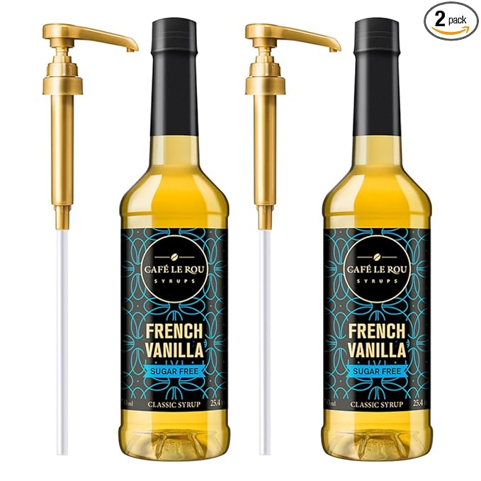 Two bottles of Café Le Rou sugar-free French vanilla syrup with gold pump dispensers, 25.4 oz classic syrup