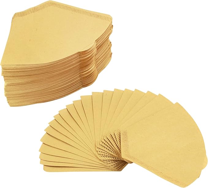 Stack and fan of brown paper coffee filters on white background