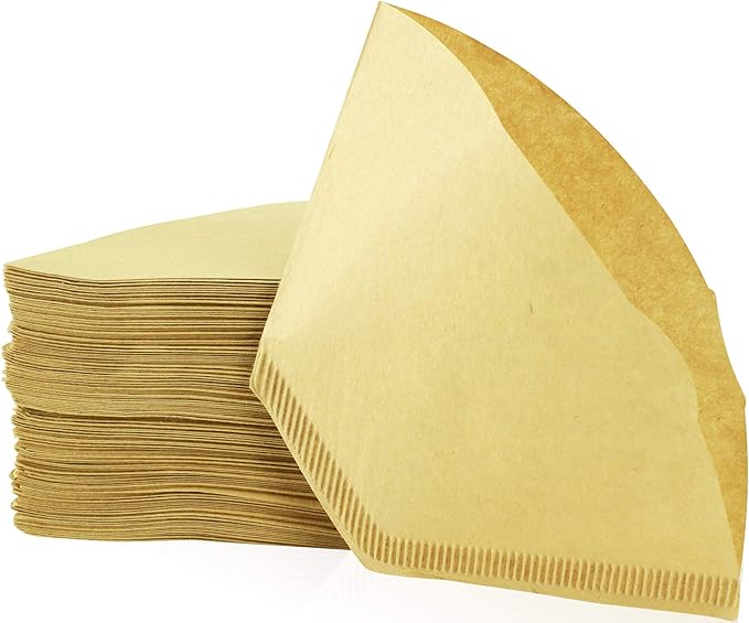 Stack of brown unbleached coffee filters with one filter slightly lifted, showing ridged edges