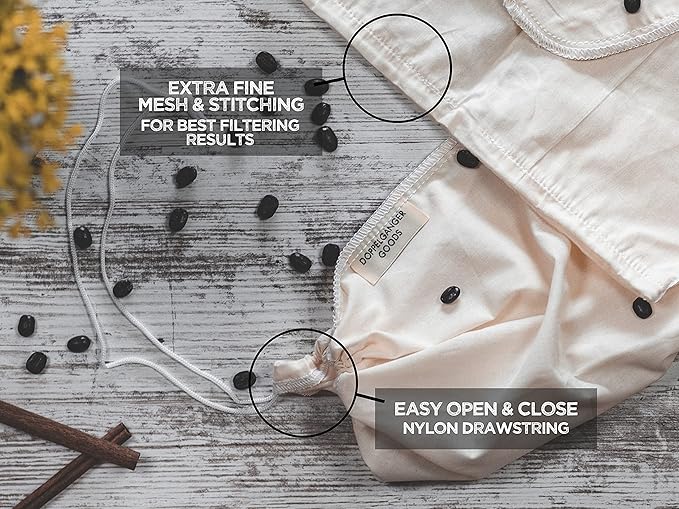 White fabric bag with fine mesh and stitching, nylon drawstring, labeled Doppelganger Goods on rustic wood surface