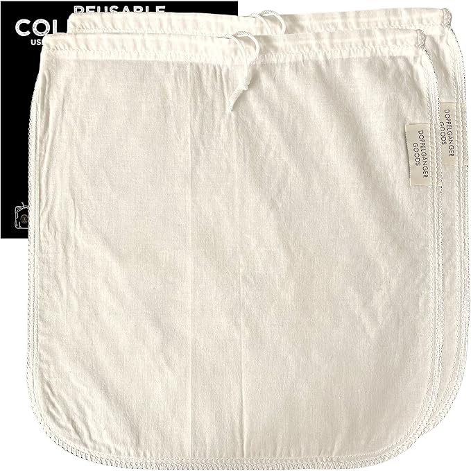 Reusable white cotton produce bags with drawstring closure from Doppelganger Goods on black background
